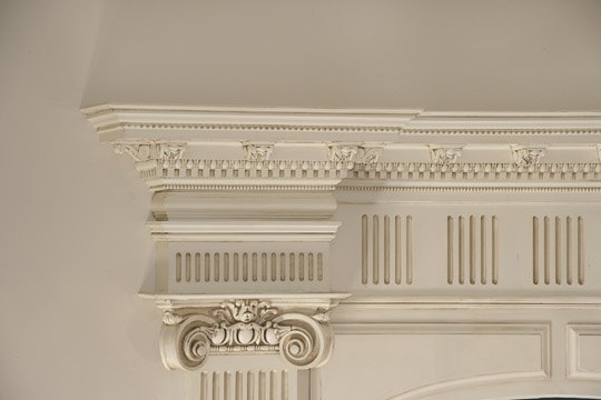 Fluted pilaster capital and cornice millwork detail